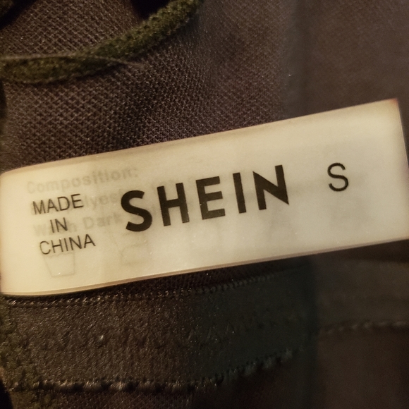 Black strappy one piece swimsuit. Can be worn several ways. Never worn in water - Picture 4 of 6